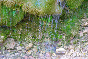 drops of water with frozen movement of a waterfall.