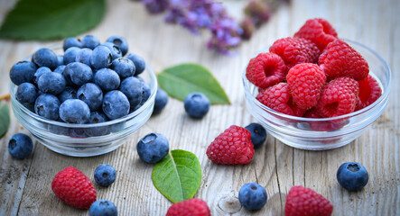 raspberries and blueberries in a bowl
