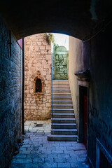 narrow alley with stairs in the old town of sibenik in croatia