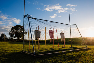 Gaelic football goal, with obstacles for training. - obrazy, fototapety, plakaty