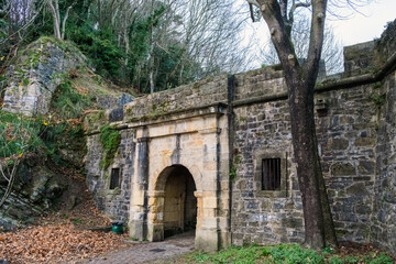 San Sebastian , Spain - December 29, 2022: The Castillo de la Mota, the fortress of San Sebastian, on Mount Urgull.