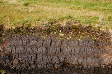 Peat blocks, in a traditional peat bog, on the coast of Ireland