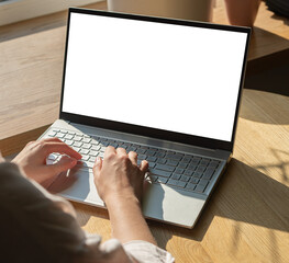 Hands at laptop with screen mockup, empty blank clean display mock upp
