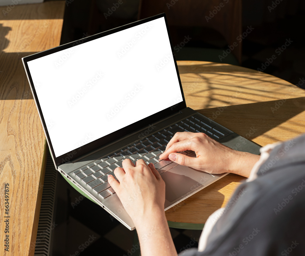 Poster hands at laptop with screen mockup, empty blank clean display mock upp