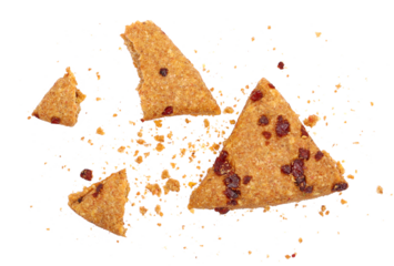 Broken integral tea pastry, cookies with cranberry and crumbs flying isolated on white, top view, clipping 