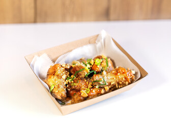 Grilled spicy chicken legs in packs for delivery