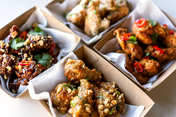 Grilled spicy chicken teriyaki legs in packs for delivery