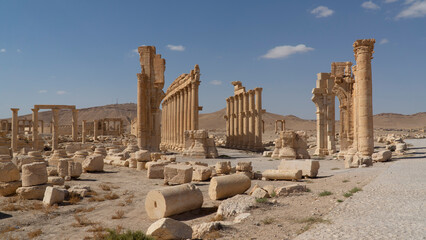 Remains of monumental arch in the eastern section of Palmyra's colonnade, Syria