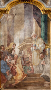 GENOVA, ITALY - MARCH 8, 2023: The fresco of St. Philip Neri at the holy communion in the church Chiesa di san Filippo Neri by Marcantonio Franceschini (1648 &ndash; 1729).
