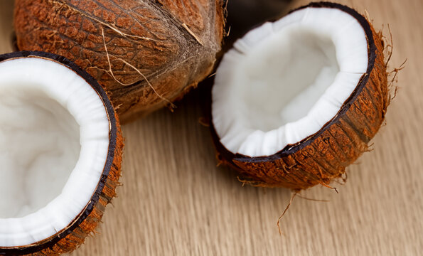 Delicious Coconut close up image with wooden background. Copy Space