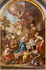 NAPLES, ITALY - APRIL 23, 2023:  The painting of Adoration of shepherds in the church Chiesa di San Nicola alla Carita by Francesco de Mura from 18. cent.