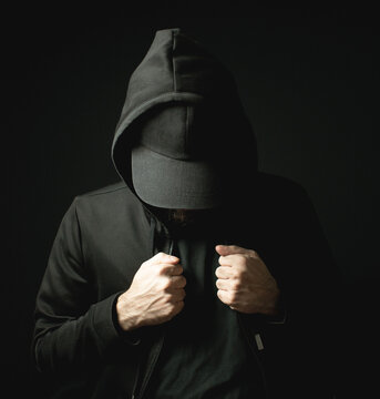 Black Hat Hoodie Sweater Man Hacker Alone in Dark