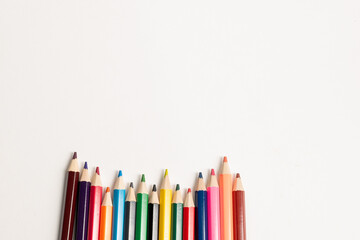 pencils on white background,Background with colored pencils. Crayons on a white background, objects for children to paint