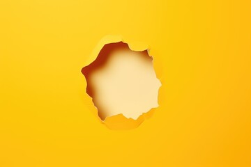 paper hole in yellow paper on light background