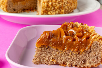 churros cake with dulce de leche on top. sweet cake dessert