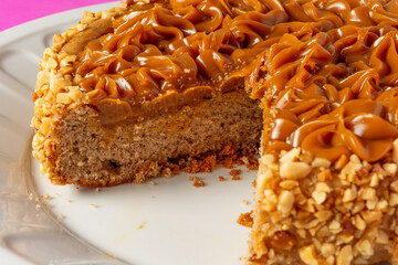 churros cake with dulce de leche on top. sweet cake dessert