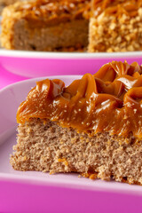 churros cake with dulce de leche on top. sweet cake dessert