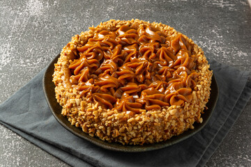churros cake with dulce de leche on top. sweet cake dessert