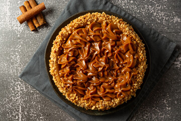 churros cake with dulce de leche on top. sweet cake dessert