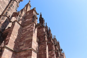 Detail of the Gothic cathedral of Freiburg im Breisgau, Germany. Vertical image.