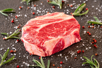 Uncooked rib eye steak