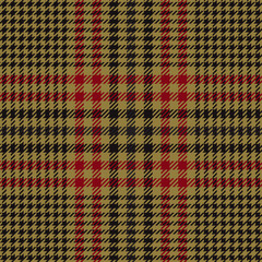 Yellow and red glen check plaid. Scottish pattern fabric swatch close-up. 