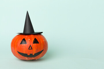 Halloween composition with jack o lanter decor on color background
