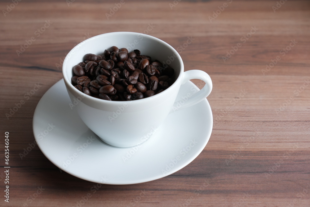 Wall mural cup of coffee with beans