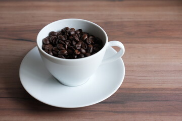 cup of coffee with beans