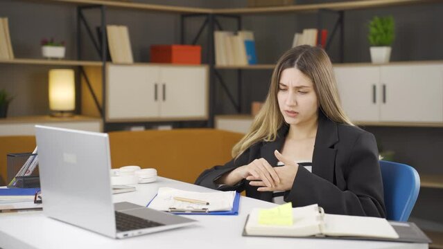 Businesswoman having heart attack.