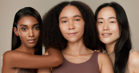 Diversity, beauty and face of women in studio for empowerment, wellness and skincare. Inclusion, friends and portrait of group of people for dermatology, natural skin and support on brown background