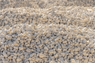 Crushed stone, building material texture, full frame. Bulk material for the construction of roads, roadways, pipe laying and utilities