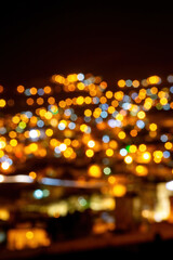 Blurred citylights in illuminated Wadi Musa, Jordan