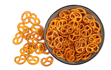 Salted pretzels pile, party snacks in bowl isolated on white, top view
 - obrazy, fototapety, plakaty