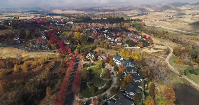 Aerial view of a residential neighborhood in the foothills with fall colors