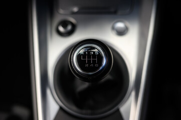 Manual six speed gear stick close up with reverse