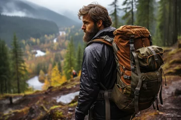 Fotobehang A hiker carrying essential survival gear and a map while exploring remote wilderness areas, exemplifying outdoor risk management. Concept of wilderness safety. Generative Ai. © Sebastian