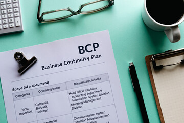 There is a desk there with dummy documents about Business Continuity Plan.