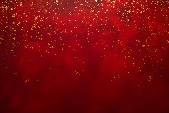 Glimmering gold star showers on a crimson canvas  
