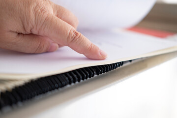 female hands through folders In Document Storage close-up, Home Archive, Record Keeping, Information Retrieval, File Organization, Document Indexing, Filing System