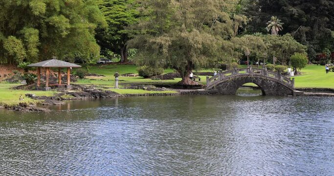 Hilo Hawaii Japanese Gardens Liliuokalani bridge tourism. Big Island. Liliʻuokalani Park and Gardens, Hilo. Largest Japanese garden part outside of Japan. Ponds, bridges, pagodas, statues, teahouse.
