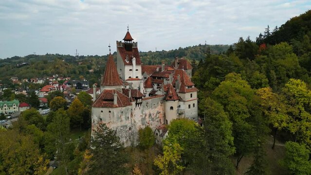 Aerial drone shot of Bran Castle in autumn. Medieval Bran Castle in Transylvania, Romania. The mystic Count Dracula's Castle is located in Bran, near the town of Brasov. 