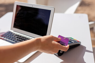 Happy person surfing online, using laptop for business communication and writing, connected in digital world with NFC technology