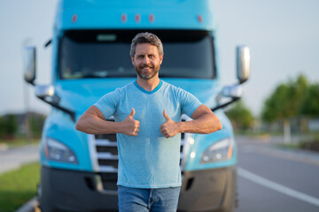 Hispanic driver near lorry truck. Man owner truck driver. Handsome hispanic man trucker trucking...