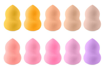 Set with makeup sponges of different colors isolated on white
