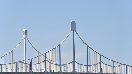 Fototapeta na wymiar suspension bridge over sky