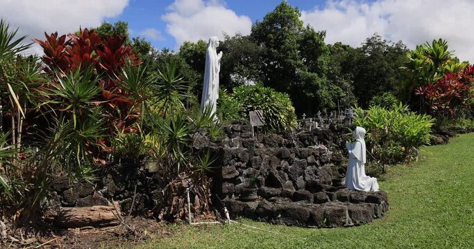 Kona Hawaii historic Painted Church Mary statue. Big Island. Overlooking beautiful and historic Kealakekua Bay, St. Benedict's Painted Church. Built 1842 with beautiful murals of biblical scenes.