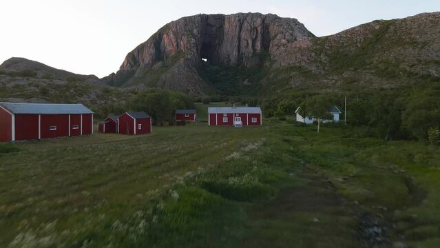 Torghatten is a mountain on Torget island in Nordland county, Norway. It is known for its characteristic hole, or natural tunnel, through its center.