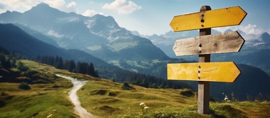 Wooden signpost with mountain background. Panoramic image