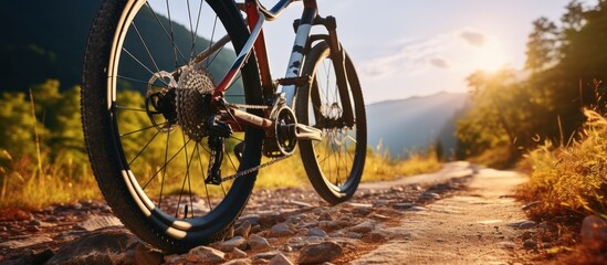 Mountain bike on the road at sunset